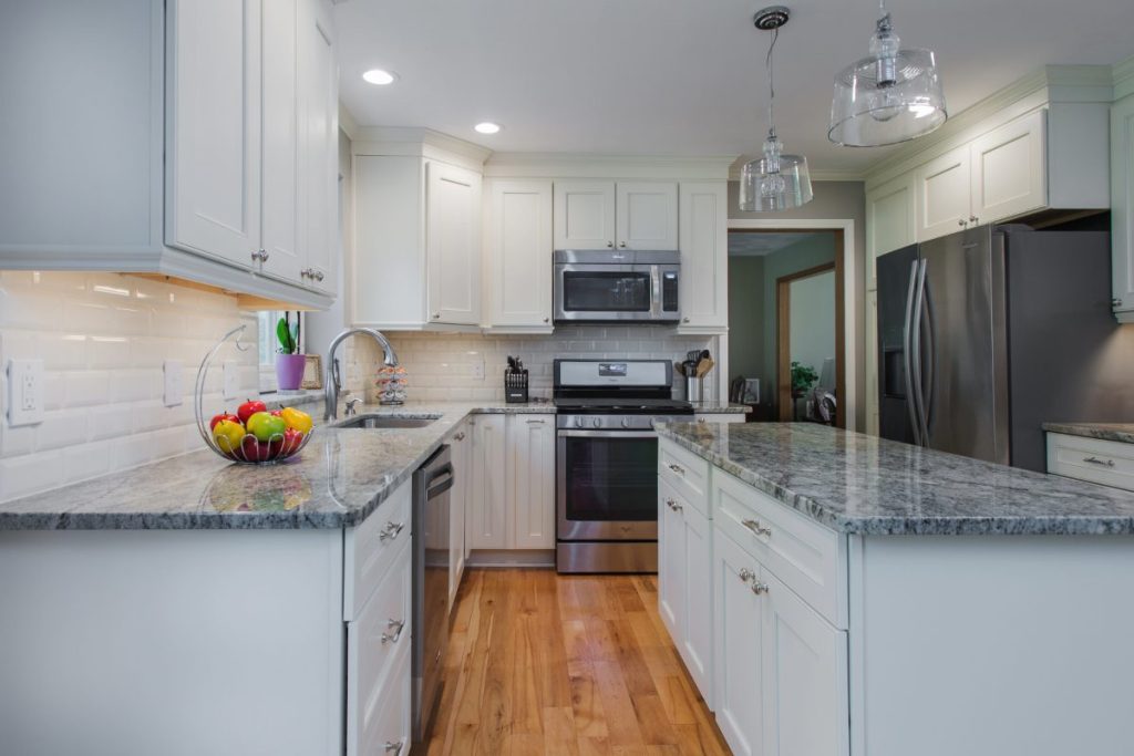 Okemos kitchen remodel with white cabinet island