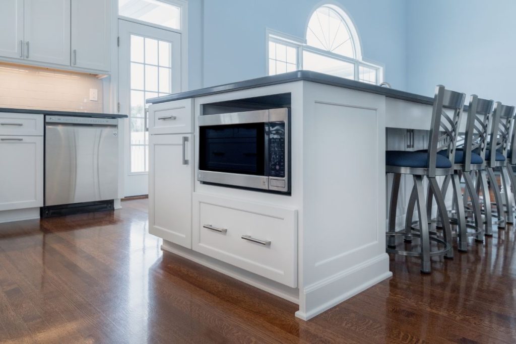 Kitchen island with built-in microwave
