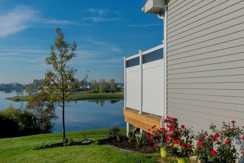 Remodeled deck with privacy panels located in Mason