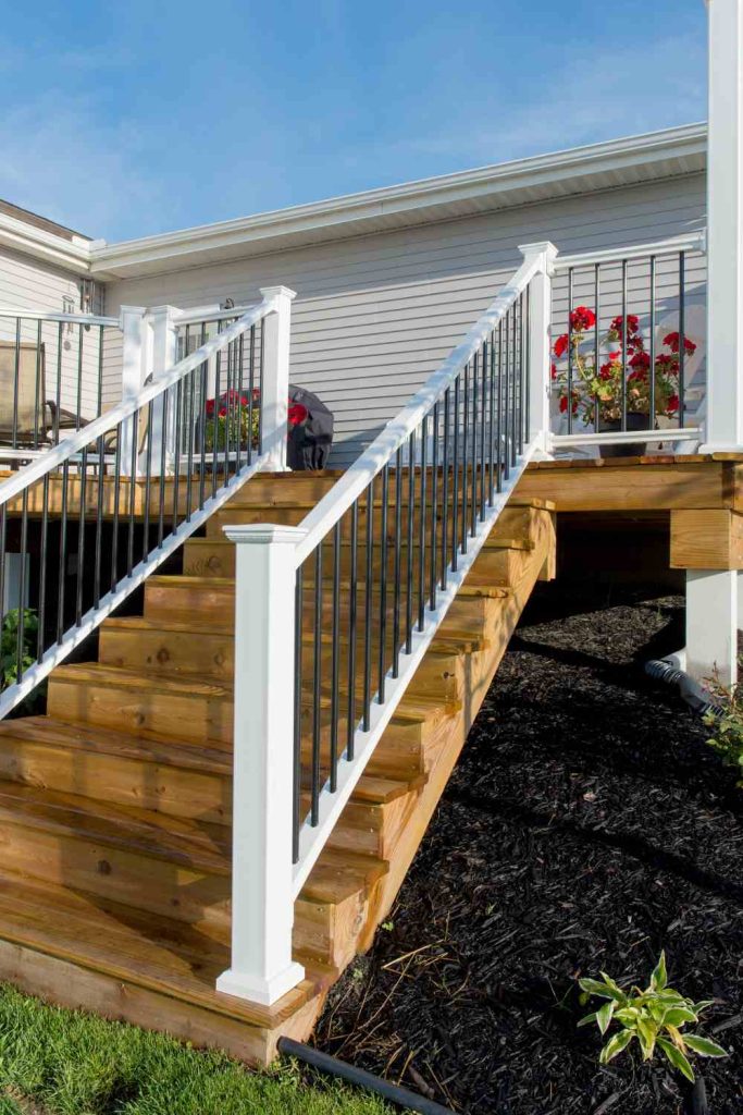 Railing on both sides of stairs to deck